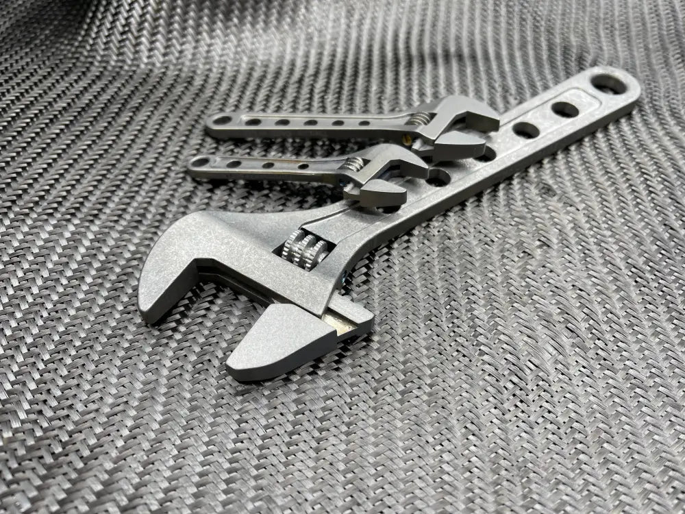 Titanium Adjustable Wrench with perforated handle design for better grip and usability