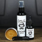 Beard care product set with All Natural Stache Wash, oil, balm, brush, and skull logo