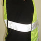 High visibility adjustable vest in fluorescent green with reflective stripes, ANSI Class II compliant