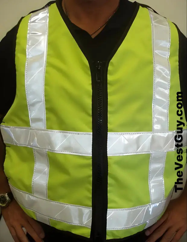 High visibility adjustable vest in fluorescent green meets ANSI Class II requirements