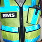 High visibility radio vest with reflective blue stripes and multiple pockets