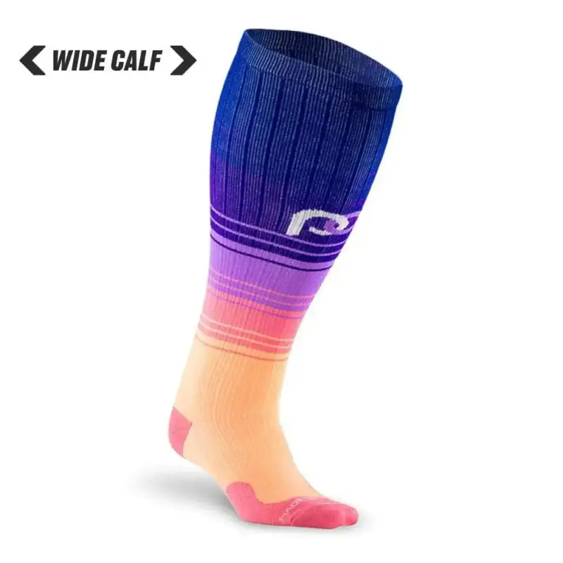 Athletic compression sock in gradient navy blue to pink, Marathon Wide-Calf Florida Skies design