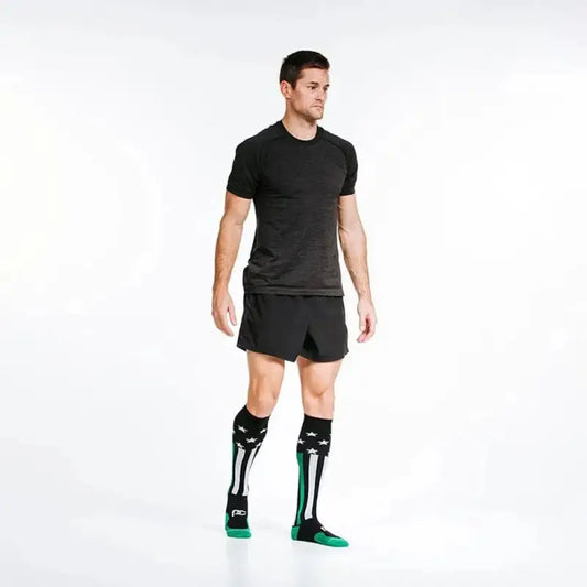 Athletic compression socks in teal and black for First Responder Green style