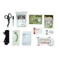 Medical first aid supplies in BearFAK 3.0 Coyote Tan kit with outer empty pouch displayed