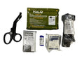 Medical trauma supplies in a coyote tan Belt Kit featuring bandages, scissors, and HALO seal