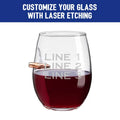 Stemless BenShot Freedom Wine Glass with red wine and laser-etched design