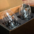 Two BenShot Freedom Wine glasses with metallic bullet designs for unique beverage enjoyment