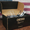 Black gift box featuring 11oz rocks glasses with CHEERS! for BenShot Gift Sets