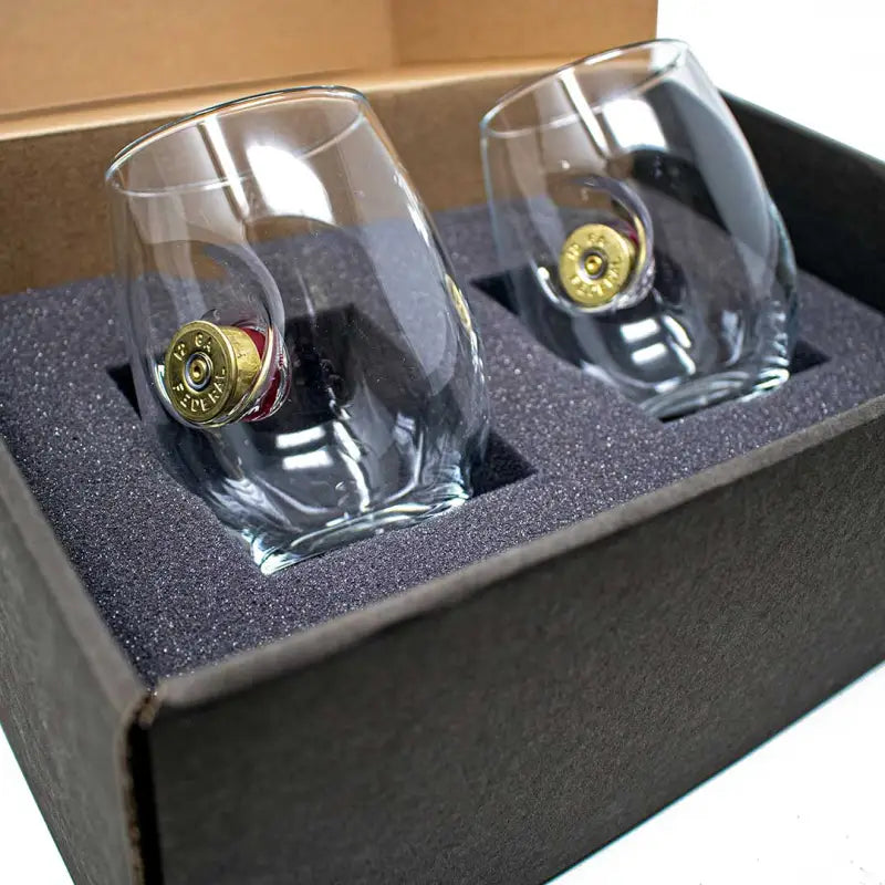 Two BenShot Shotgun Shell Glasses with bullet casings in the bases