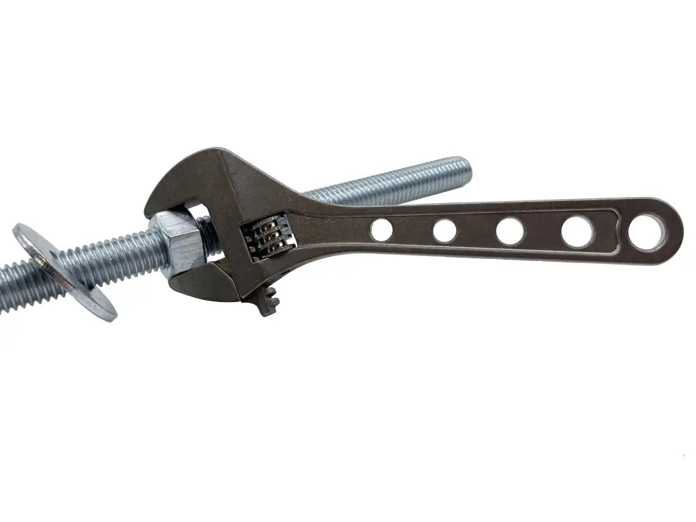 Black adjustable wrench gripping a threaded bolt for Adjustable Wrench - Titanium NSN Pending