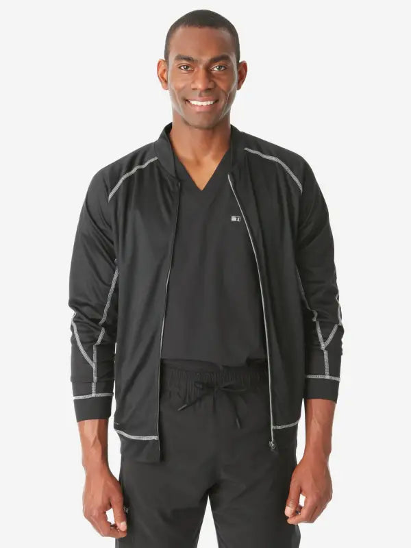 Black athletic Men’s Scrub Jacket with gray contrast stitching and piping