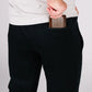 Black athletic pants featuring a patented carrier retention waistband and functional zipper fly