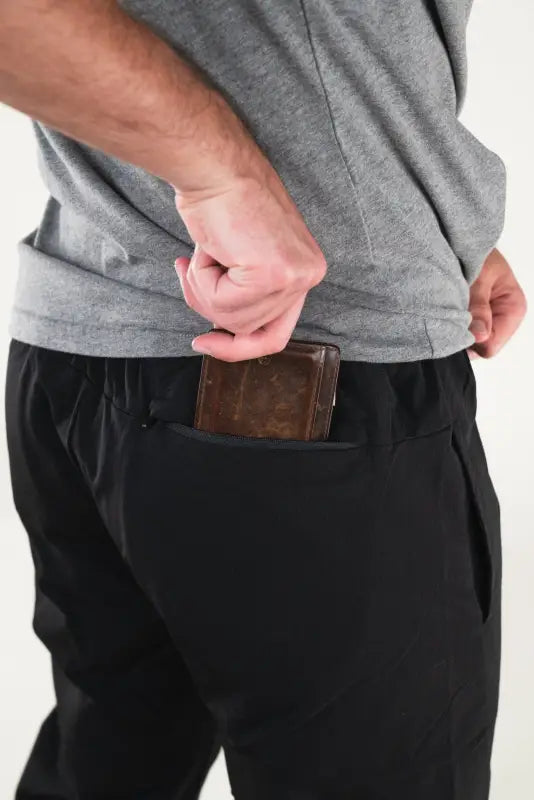 Black Carrier Traveler Joggers with concealed carry wallet in pocket for added convenience