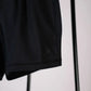 Black athletic shorts from Arrowhead Tactical Apparel designed for concealed carry