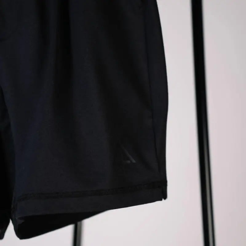 Black Carrier Shorts Mk.II with 7-inch inseam, ideal for concealed carry and tactical wear