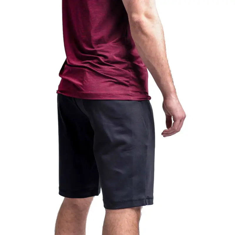 Black athletic shorts and burgundy shirt showcasing Arrowhead Tactical Apparel Carrier Shorts