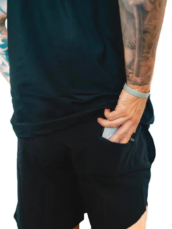 Black athletic shorts with a side pocket from Men’s Shorts Response collection