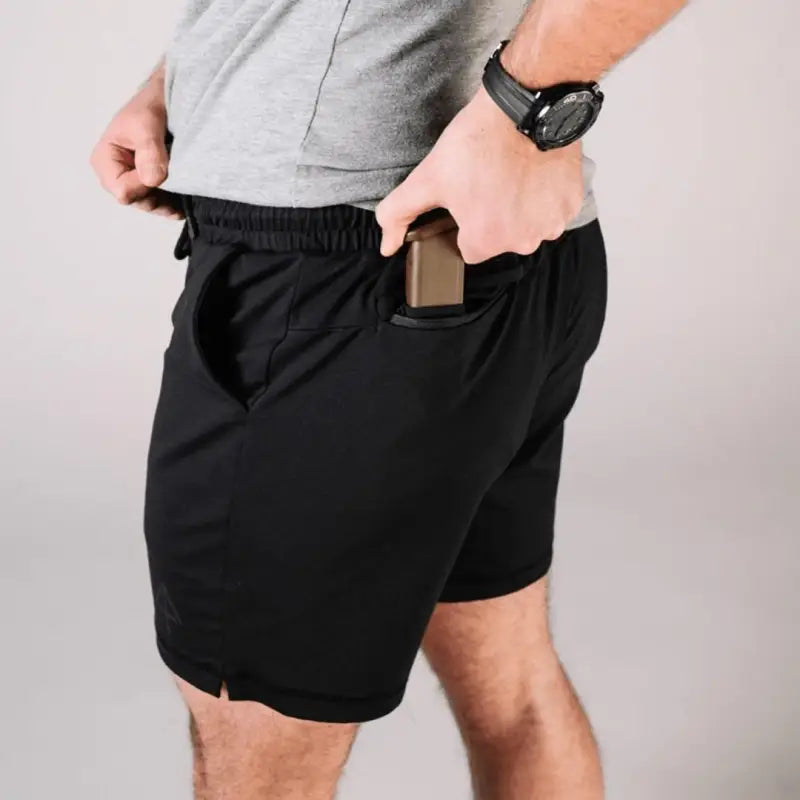 Black Carrier Shorts Mk.II with pockets for concealed carry, part of Arrowhead Tactical Apparel
