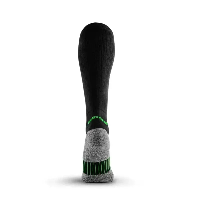 Black Tall Compression Socks with gray cushioning and green accents for long distance courses