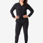 Black athletic tracksuit featuring a women’s long-sleeve scrub top and jogger pants