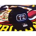 Black baseball cap with 72 patch emblem from the Apparatus Number Passport collection