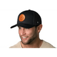 Black America Snapback featuring an orange patch logo on a USA Trucker Hat leather design