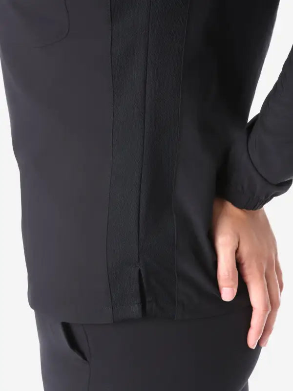 Black blazer sleeve with side vent detail on Women’s Long-Sleeve Scrub Top