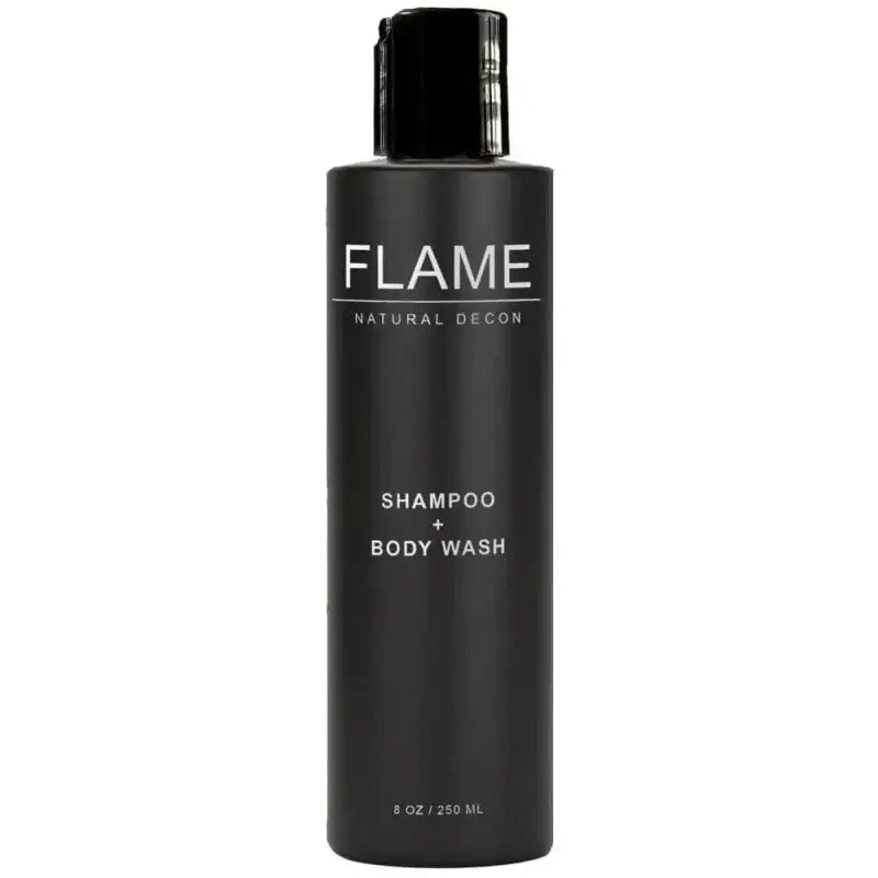 Black bottle of Flame Shampoo + Body Wash with activated charcoal and naturally derived ingredients