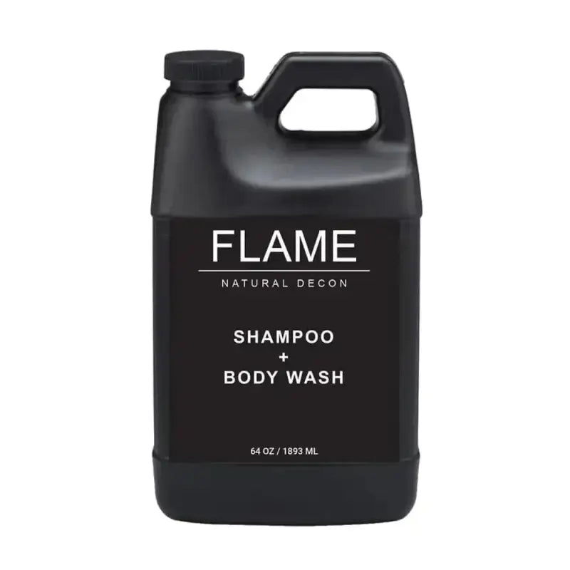 Black bottle of Flame Shampoo + Body Wash with activated charcoal and naturally derived ingredients