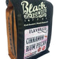 Black and bronze Black Powder cinnamon rum pecan flavored coffee bag with flavor label