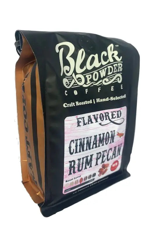 Black and bronze Black Powder cinnamon rum pecan flavored coffee bag with flavor label
