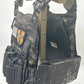 Black camouflage tactical plate carrier with molle webbing and pouches from Redemption Tactical