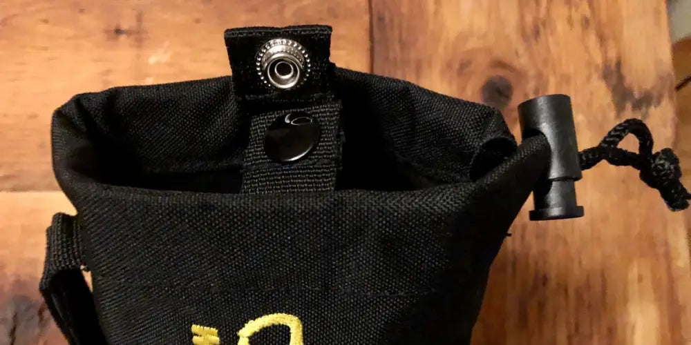 Black chalk bag with drawstring for personal carry and fireground applications for first responders