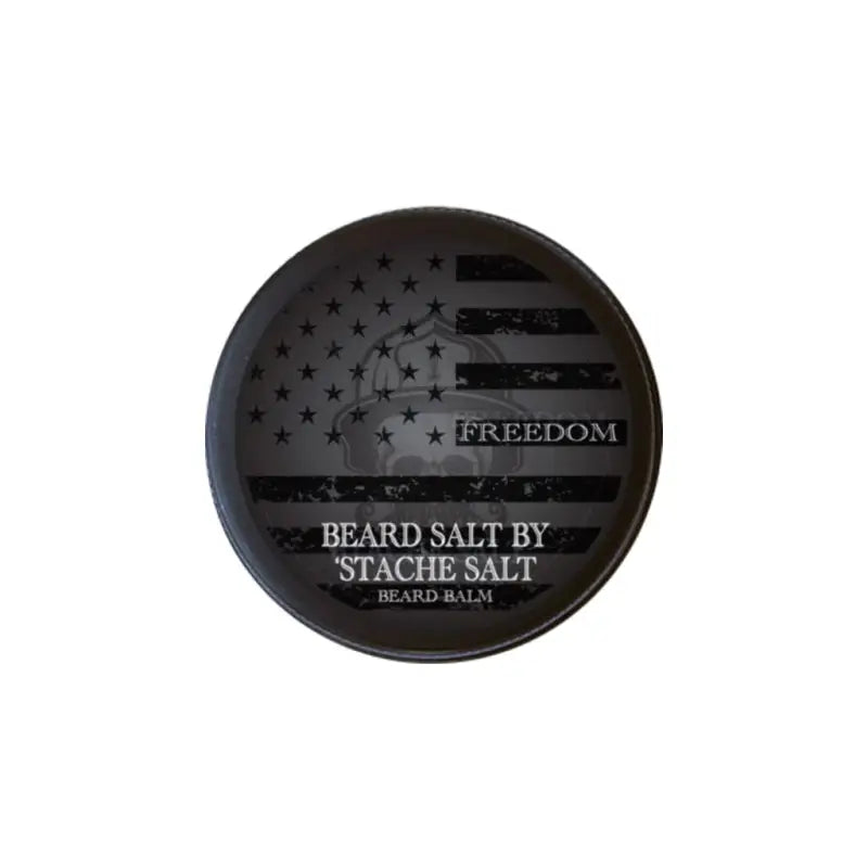 Black circular Freedom Beard Balm container with American flag design and text