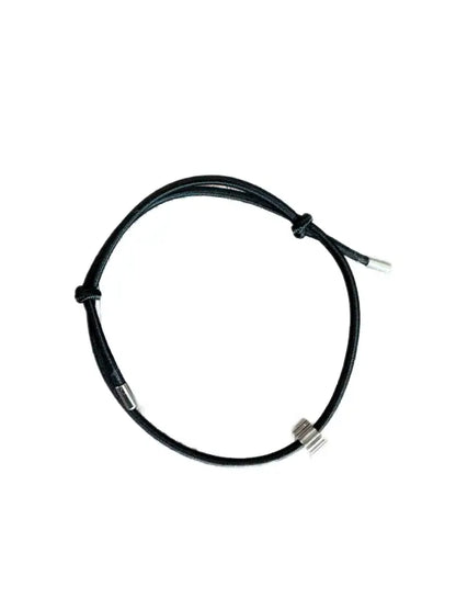 Black circular cable with metal connectors for The Breaklet - Emergency Escape Bracelet