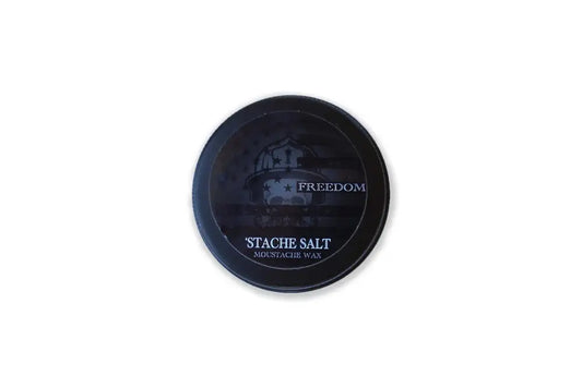 Black circular tin of Stache Salt Freedom Blend Extra Strong Moustache Wax