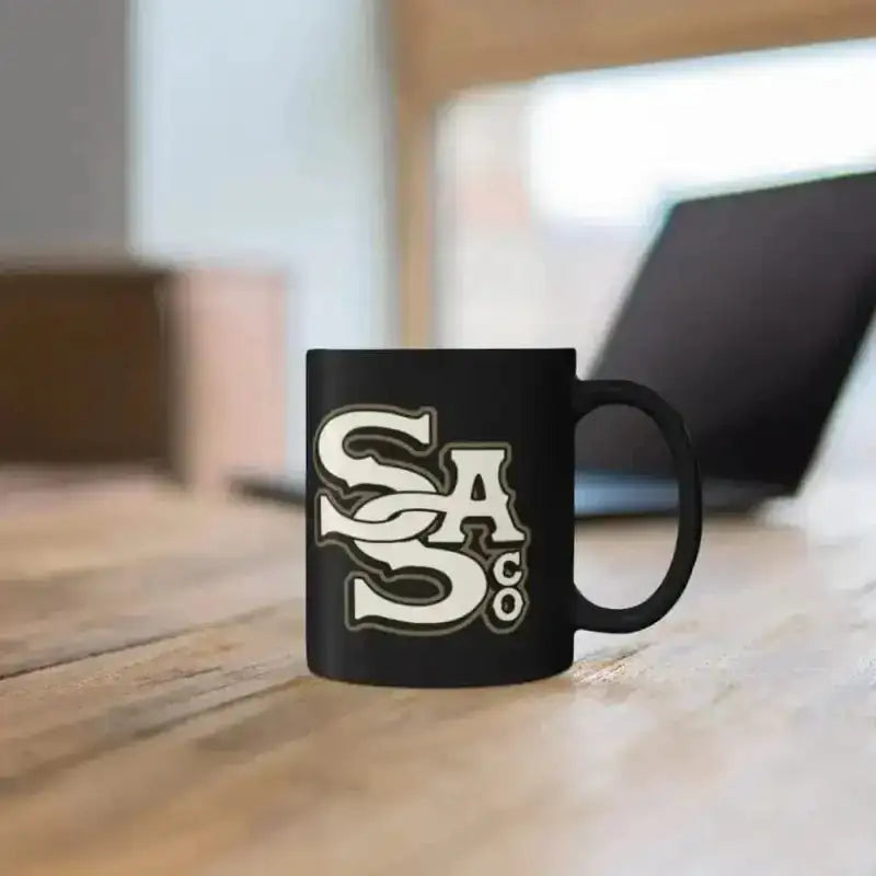 Black ceramic Letter Stack Mug featuring white SA logo for stylish coffee enjoyment