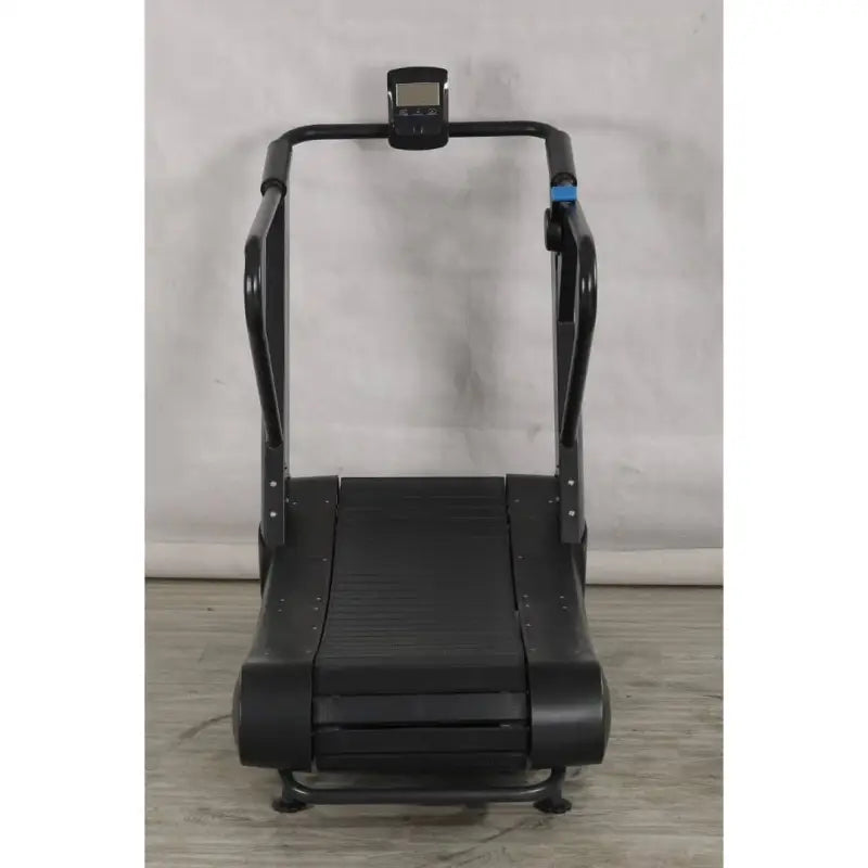 Black curved treadmill designed for first responders, firefighters, and police training