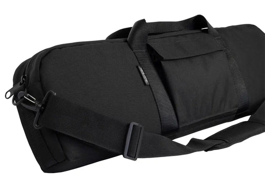 Black cylindrical duffel bag with straps for Pistol Grip Shotgun transport