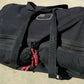 Black Wildland Gear Bag with patches, zipper pockets, and hand grips for outdoor use