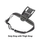 Black duty drop with thigh strap for Glock 19 in competition holster with Nightstick TCM-10 and weapon lights