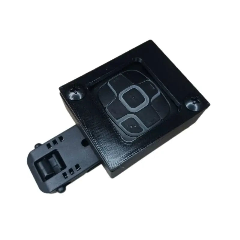 Black camera remote holder with locking mechanism from Adam’s Gear Solutions