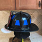 Black firefighter helmet with blue reflective markings for safety in BLUE REFLECTIVE HELMET