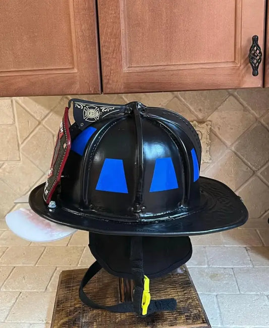 Black firefighter helmet with blue reflective markings for safety in BLUE REFLECTIVE HELMET