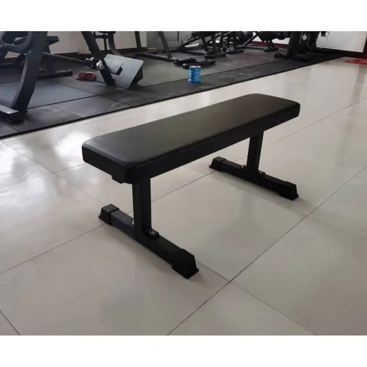 Black flat weight bench for fitness training, ideal for first responders, firefighters, police