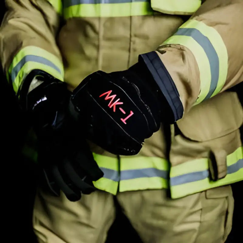 Black MK-1 Structural Firefighting Glove featuring Kevlar Knit protection in red lettering