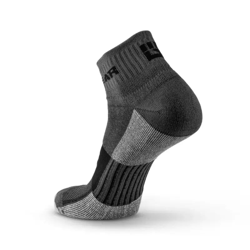 Black and gray MudGear Quarter athletic ankle socks with ribbed design for trail use