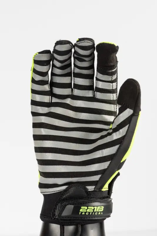 Black and gray striped Exxtremity Patrol Gloves 2.0 with hi-vis yellow accents