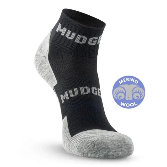 Black and grey MudGear Quarter Crew Merino Wool Socks featuring merino wool content