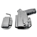 Black Springfield Hellcat Pro holster with magazine carrier and Streamlight TLR-7 suited for Four Brothers IWB RH use